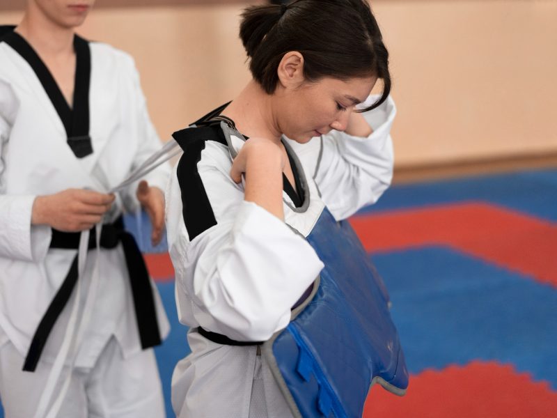 people-practicing-taekwondo-in-a-gymnasium-2.jpg