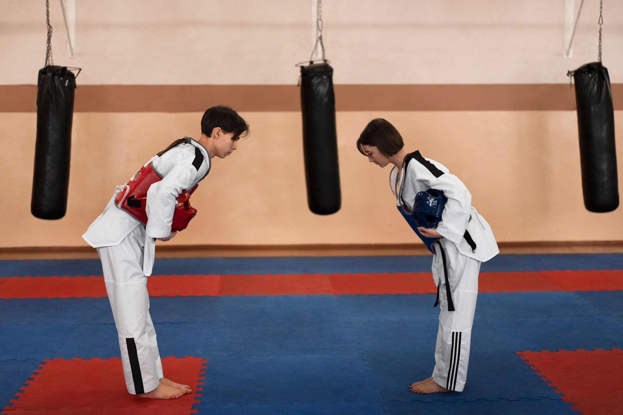 people-practicing-taekwondo-in-a-gymnasium-3.jpg